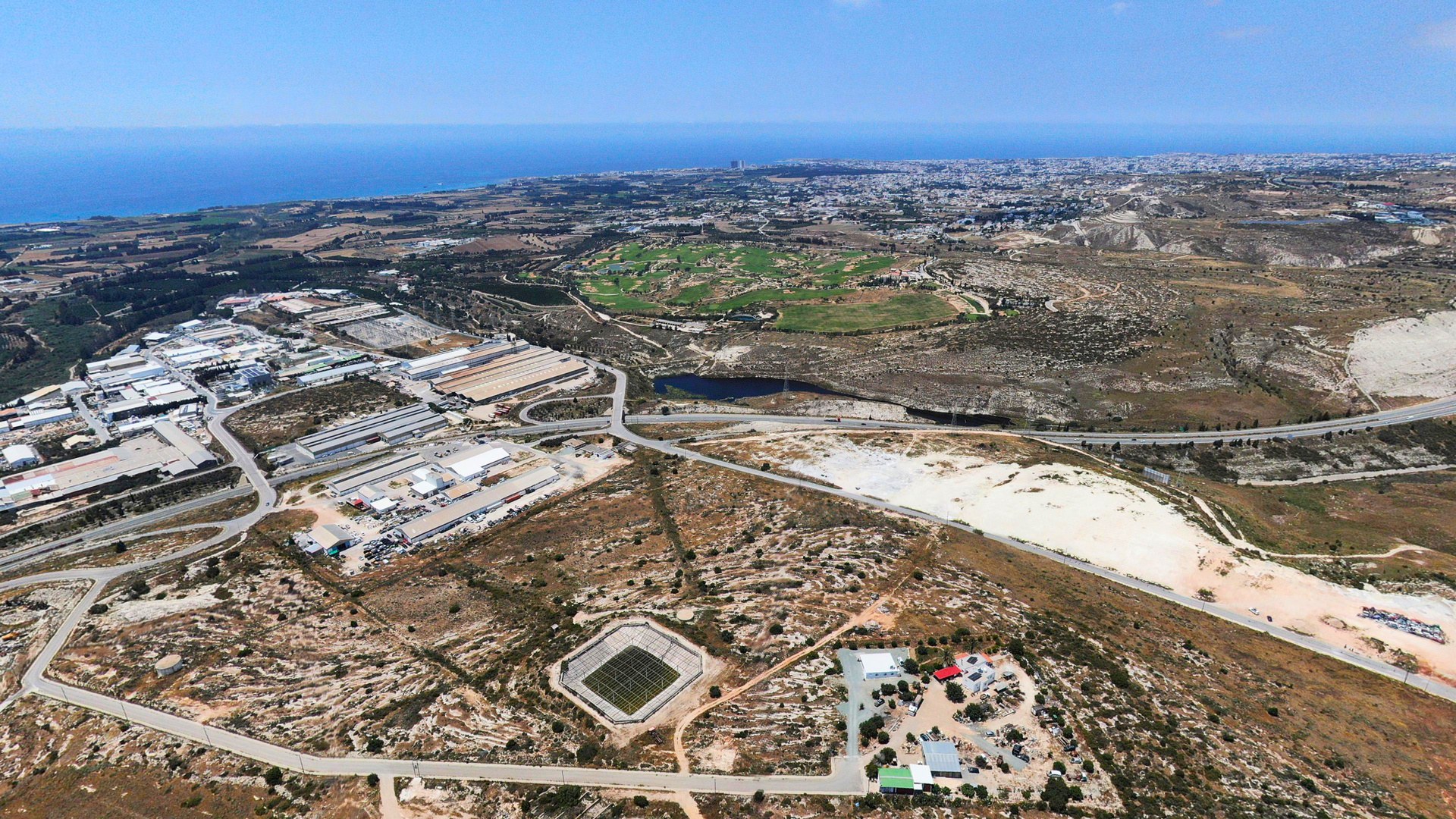 Aerial view of the Anatoliko industrial area and Paphos coastline